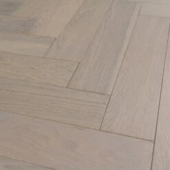 Liberty Floors Pebble Grey Oak - Herringbone Parquet 14mm Engineered Real Wood Flooring (219386) -Leader Floors pebble grey oak herringbone parquet 14mm engineered real wood flooring 219386 p85834 201394 image
